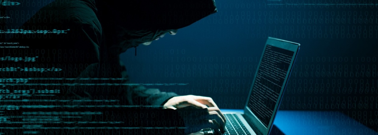 Hacker achter laptop